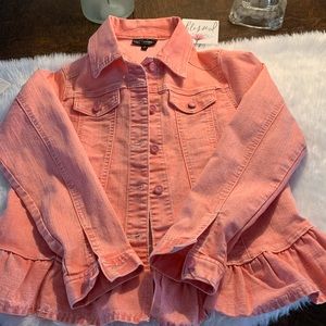 NWOT. Pink jean jacket with peplum ruffled hem.